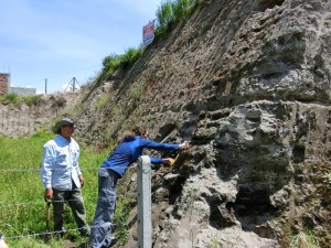 IBEDs Crystal McMichael hard at work sampling sediments in the Andes