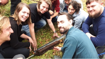 Britte (far left) raises her first sediment core during the Palaeoecology course in 2016!